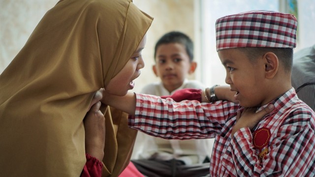 Cara Mereka yang Tuli Mengaji (402877)