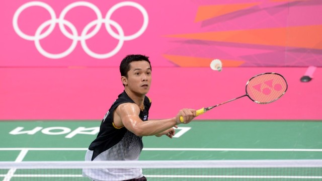 Taufik Hidayat saat bertanding di Olimpiade London 2012. Foto: AFP/ ADEK BERRY