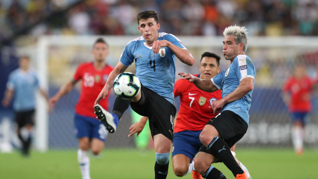 Laga Cile melawan Uruguay. Foto: REUTERS/Ricardo Moraes