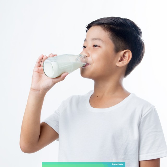 com-Ilustrasi anak minum susu. Foto: Shutterstock
