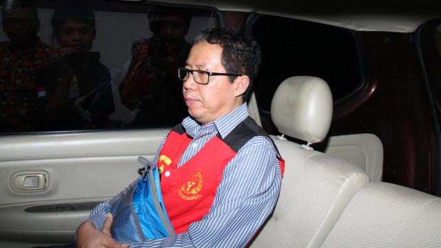 Mantan Plt. Ketua Umum PSSI, Joko Driyono di dalam mobil tahanan usai menjalani sidang di Pengadilan Negeri Jakarta Selatan, Kamis (4/7). Foto: Nugroho Sejati/kumparan