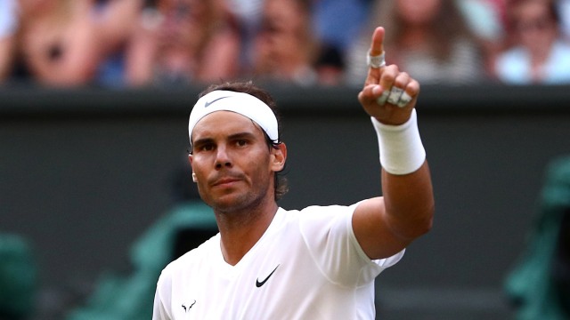Rafael Nadal usai mengunci kemenangan atas Nick Kyrgios di babak kedua tunggal putra Wimbledon 2019. Foto: REUTERS/Hannah McKay