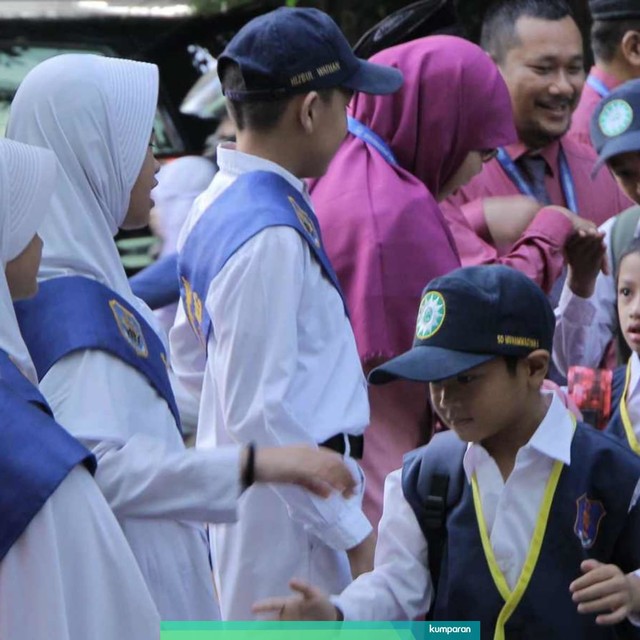 Suasana SD Muhammadiyah 5 Jakarta, Kebayoran Baru, Jakarta Selatan,  saat hari pertama masuk sekolah (15/7). Foto: Jamal Ramadhan/kumparan