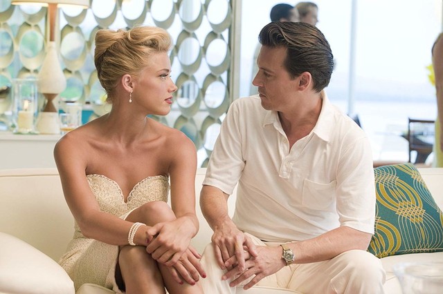 Johnny Depp dan Amber Heard di film 'Film The Rum Diary' Foto: dok. FilmDistrict