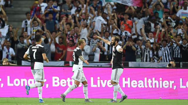 Higuain merayakan gol di ICC 2019. Foto: Roslan RAHMAN / AFP