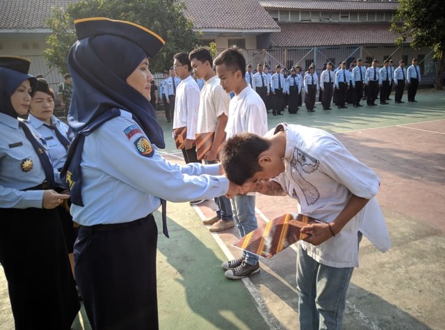 Lembaga Pembinaan Khusus Anak Tangerang menggelar Apel Pemberian Remisi Anak pada Hari Anak Nasional 2019. (Foto: Kemenkumham)