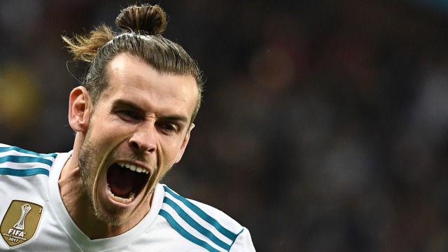 Gareth Bale merayakan gol ke gawang Liverpool di final Liga Champions 2017/18. Foto: AFP/Franck Fife