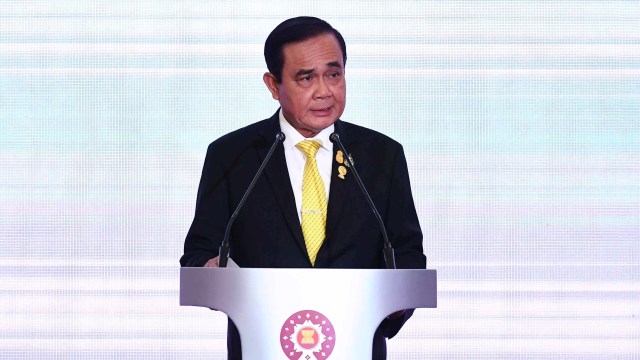 Perdana Menteri Thailand Prayut Chan-O-Cha menyampaikan pidato  upacara pembukaan Pertemuan Menteri Luar Negeri Perhimpunan Bangsa-Bangsa Asia Tenggara (ASEAN) ke-52 di Bangkok, (31/7). Foto: AFP/Lillian SUWANRUMPHA