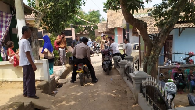 Suasana di sekitar lokasi pembunuhan sekeluarga di Serang