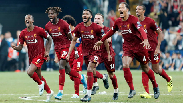 Ekspresi kebahagiaan para pemain Liverpool. Foto: REUTERS/Kemal Aslan