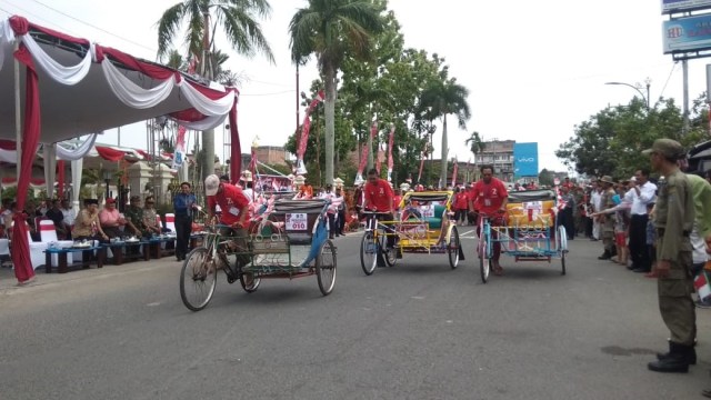 Lomba becak kayuh. Foto: Ist