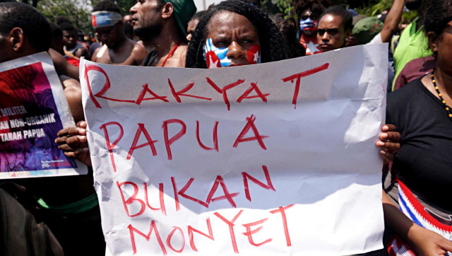 Pemuda dan mahasiswa Papua melakukan aksi demonstrasi di sekitar Mabes TNI Angakatan Darat, Jakarta, Kamis (22/8). Foto: Fanny Kusumawardhani/kumparan