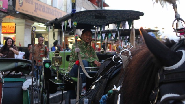 Kusir yang kini jadi mitra Grab Andong di Yogyakarta. Foto: Selfy Sandra Momongan/kumparan