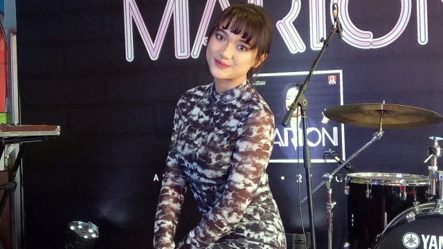 Marion Jola merilis album perdananya di KFC Cideng, Jakarta Pusat, Selasa (27/8). Foto: DN. Mustika Sari/kumparan