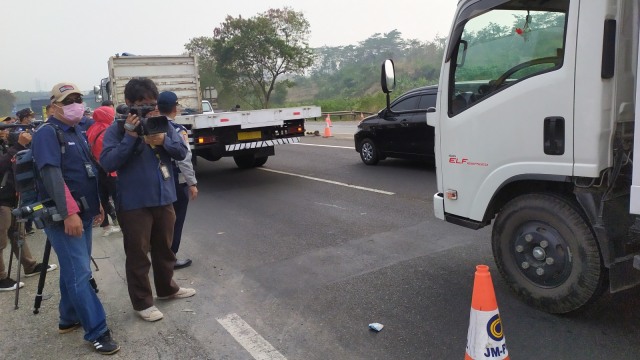Polisi akan melakukan olah Tempat Kejadian Perkara (TKP) kecelakaan beruntun yang terjadi di Tol Purbaleunyi KM 91, Selasa (3/9). Foto: Rachmadi Rasyad/kumparan