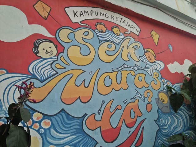 Mural di Kampung Ketandan yang jadi ikon kampung ini. Foto-foto : Amanah Nur Asiah/Basra