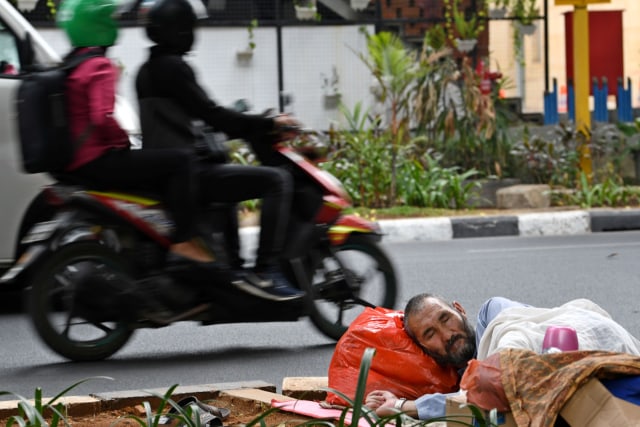 Foto: Pencari Suaka Kembali Tempati Trotoar Kebon Sirih (231509)