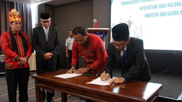 Penandatanganan kerja sama dengan Dinas Pendidikan Dayah Aceh tentang penerapan karakter berbasis pendidikan keagamaan terhadap warga binaan. Foto: Zuhri Noviandi/kumparan