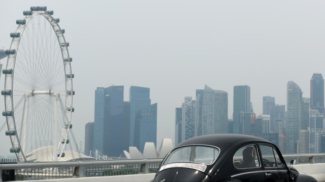 Suasana kota Singapura yang diselimuti kabut asap. Foto: AFP/ROSLAN RAHMAN