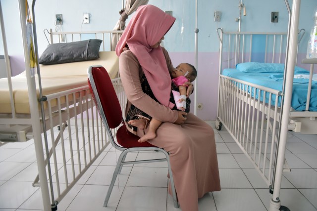 Foto: Menderita ISPA Akibat Karhutla (1029699)