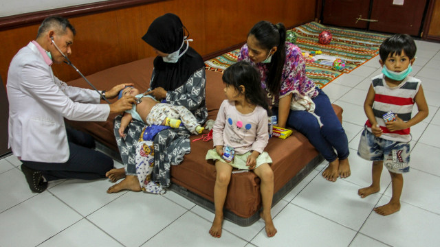 Foto: Menderita ISPA Akibat Karhutla (1029701)