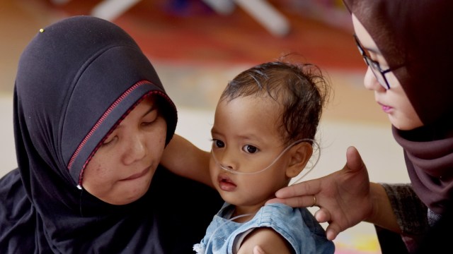 Foto: Menderita ISPA Akibat Karhutla (1029697)