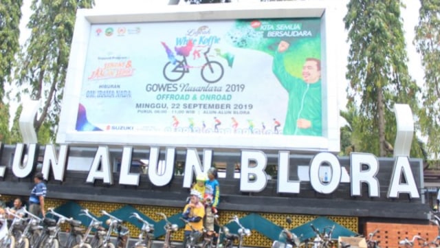 Wajah Tersangka Korupsi Hibah Koni Sambut Peserta Gowes Nusantara 2019