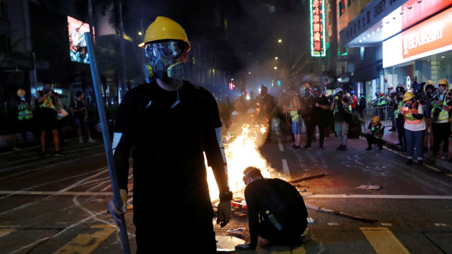 Aksi demonstran saat protes di Hong Kong, Minggu (29/9/2019). Foto: REUTERS/Tyrone Siu