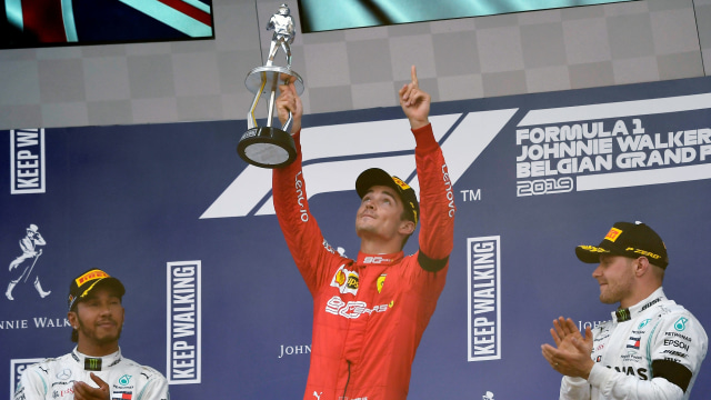 Charles Leclerc di podium puncak GP Belgia. Foto: JOHN THYS / AFP