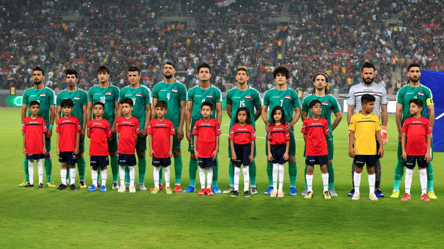 Para pemain Timnas Irak sebelum laga lawan Hong Kong Foto: REUTERS/Thaier Al-Sudani