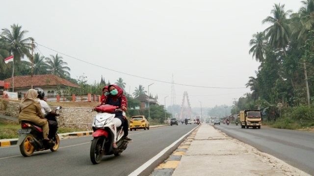 Kabut Asap di Kabupaten Dharmasraya (Foto: Zulfikar/Langkan.id)