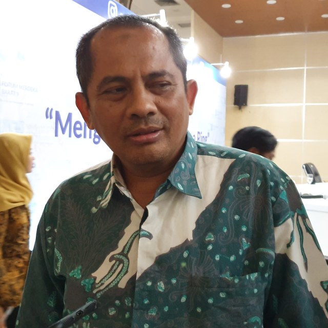 Andi Agus Akbar, VP Regulatory Management Telkomsel