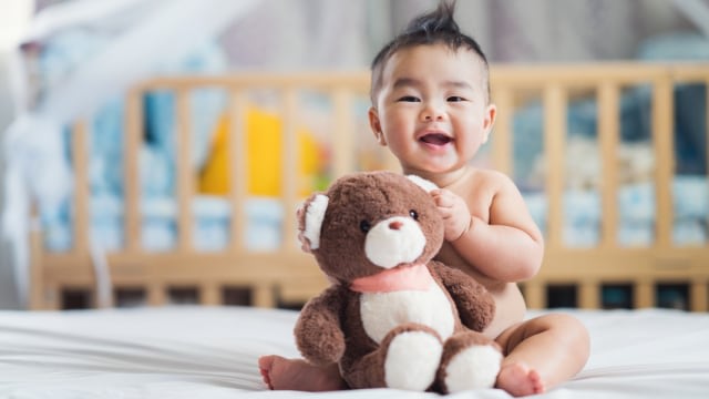 Ilustrasi bayi tersenyum. Foto: Shutterstock