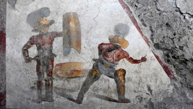 Sebuah lukisan menggambarkan dua orang gladiator yang tengah bertarung ditemukan di Pompeii. Foto: Archaeological Park of Pompeii