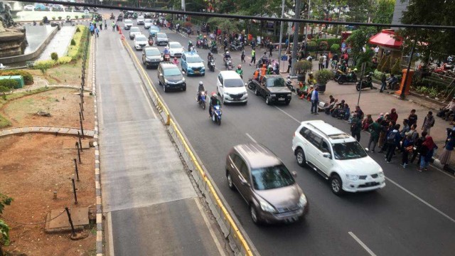 Lalu lintas di Jalan Medan Merdeka Barat, Jakarta, kembali normal. Foto: Andesta Herli/kumparan