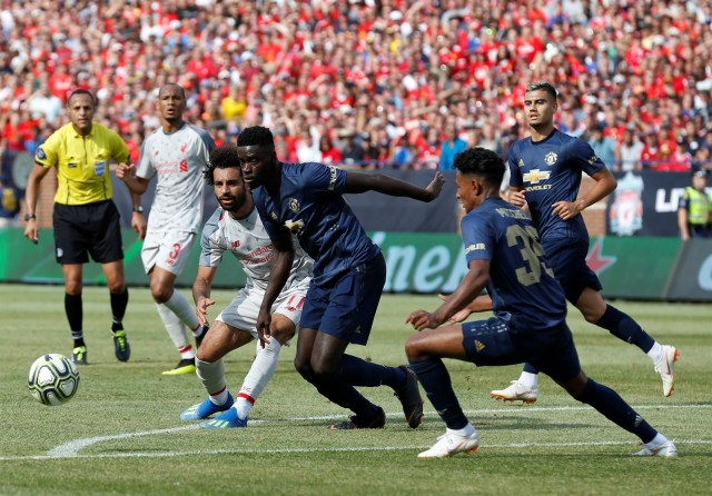Duel Manchester United vs Liverpool di pramusim. Foto: Jeff Kowalsky/AFP