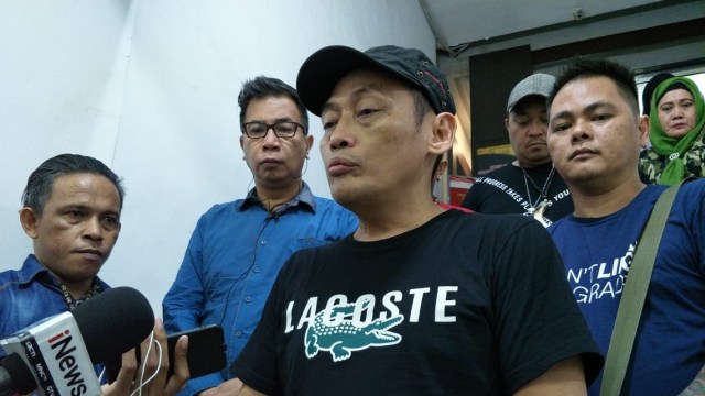 Ninoy Karundeng di Polda Metro Jaya, Jakarta Selatan, Jumat (18/10).  Foto: Fachrul Irwinsyah/kumparan