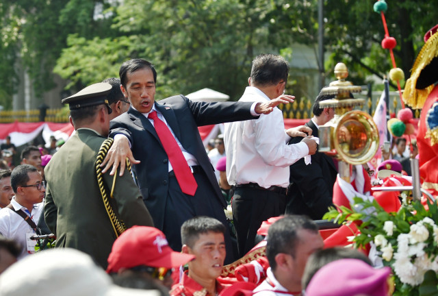 Beda Cara Relawan Rayakan Pelantikan Jokowi di 2014 dan 2019 (47273)