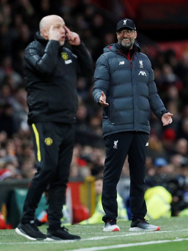 Pelatih Liverpool, Juergen Klopp (kanan) di laga melawan Liverpool.  Foto: REUTERS/Russell Cheyne
