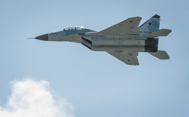 IIlustrasi jet tempur Rusia. Foto: AFP/MLADEN ANTONOV