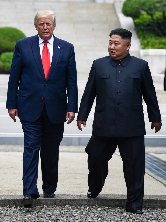 Donald Trump dan Kim Jong Un. Foto: AFP/Brendan Smialowski
