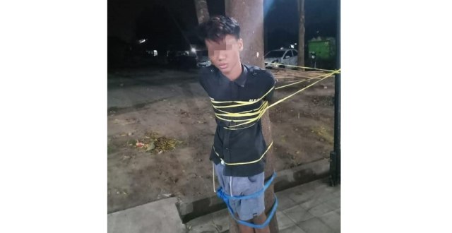 Seorang remaja diikat di Pohon karena mabuk dan meresahkan warga (kanalbali/KAD)