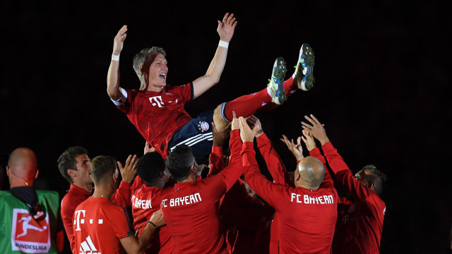 Bastian Schweinsteiger, sang pemenang itu. Foto: Christof STACHE / AFP