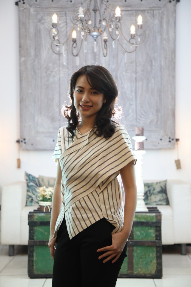 Risa Santoso, rektor termuda, POTRAIT