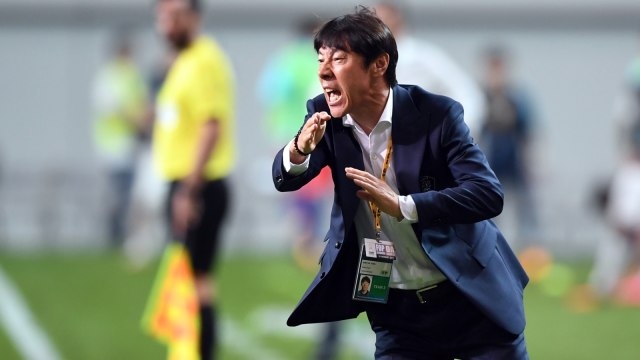Shin Tae-yong saat masih menjadi pelatih Timnas Korea Selatan. Foto: AFP/Jung Yeon-je