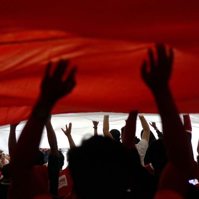 Aksi pendukung Indonesia di Stadion Bukit Jalil, Malaysia. Foto: Nugroho Sejati/kumparan