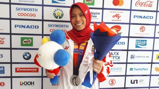  Lisa Setiawati, lifter senior Indonesia