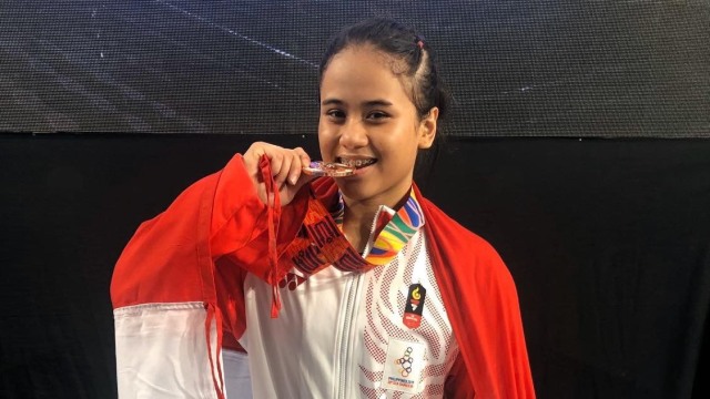 Putri Andriani, peraih perunggu untuk cabor Angkat Besi putri SEA Games 2019. Foto: Dok. SEA Games 2019