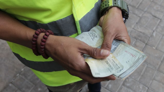 Uang hasil parkir. Foto: Irfan Adi Saputra/kumpran