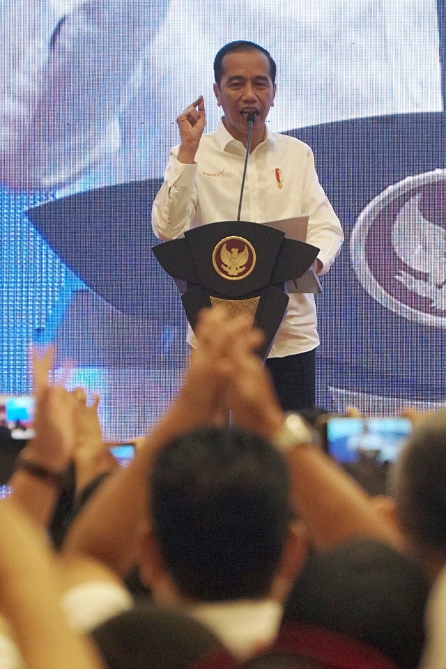 Presiden Joko Widodo memberikan sambutan dalam Kongres II Projo di JIExpo Kemayoran, Jakarta, Minggu (7/12). Foto: Fanny Kusumawardhani/kumparan